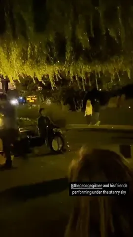 @thegeorgegilmer and his friends performing under the starry sky